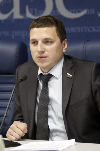 Александр Васильев