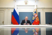 Путин поздравил россиян с Днем защитника Отечества