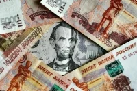 МВФ: Санкции против России могут ослабить позиции доллара