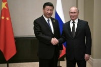 Путин поздравил Си Цзиньпина с переизбранием на пост генсека ЦК Компартии Китая