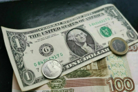Эксперт заявил, что рост курса доллара не связан с нефтяным эмбарго