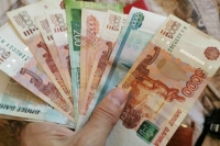 Минтруд подготовил законопроекты о сохранении пособий на детей при увеличении доходов 