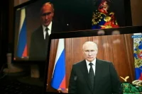 Путин назвал попытку расколоть общество ударом в спину 