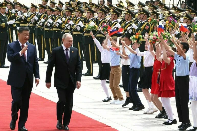 Путин поблагодарил Си Цзиньпина за теплый прием в Китае