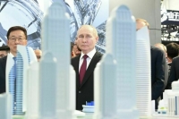 Путин: Россия и Китай работают над решениями по сокращению углеродных выбросов