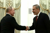 Путин провел встречу с главой МИД Турции