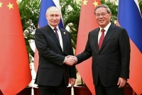 Путин в Кремле принимает председателя Госсовета КНР 