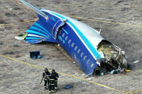 Казахстан проведет две экспертизы для расследования крушения самолета