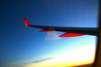 Минтранс поддержал идею об объявлении в самолетах почетных статусов городов прибытия