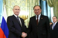 Путин рассказал, как премьер Малайзии ответил на загадку о трех тронах