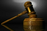 Трое россиян получили от 15 до 19 лет за поджоги и призывы к терроризму