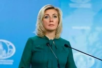 Захарова заявила о безумии западных СМИ из-за встречи Путина и Трампа
