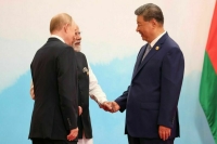 Ушаков: Путин на саммите в КНР рассказал об итогах встречи с Трампом