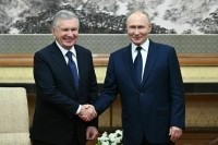 Путин провел встречу с президентом Узбекистана в Китае