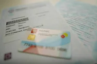 Трудовым мигрантам хотят усложнить получение полиса ОМС