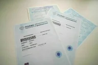 При выдаче полиса ОМС иностранцам предложили повысить страховой стаж