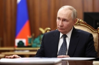 Путин: Для обеспечения армии отечественной одеждой сделано не все