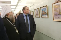 Заместитель Председателя Государственной Думы Петр Толстой и Митрополит Ростовский и Новочеркасский Меркурий во время осмотра выставки