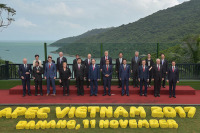 Лидеры АТЭС договорились решить проблему нечестной торговли