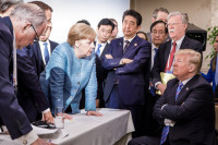 Захарова прокомментировала фотографию Трампа и Меркель на саммите G7