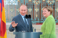 Путин и Меркель обсудили транзит газа через Украину, сообщил Песков