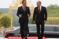 Путин и Макрон отметили необходимость продвижения политического процесса в Сирии