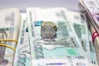Курс рубля вырос вслед за стоимостью нефти