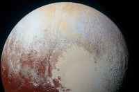 Учёные: горные вершины Плутона покрыты метановым инеем 