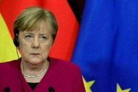 Меркель раскрыла детали телефонного разговора с Путиным