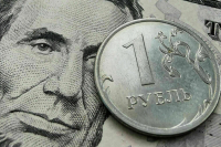 Рубль дешевеет к доллару и евро 