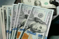 Экономист объяснил, что может стать причиной утраты доверия к доллару в мире