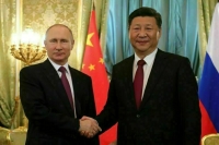 Президент России считает политический тандем Москвы и Пекина образцовым
