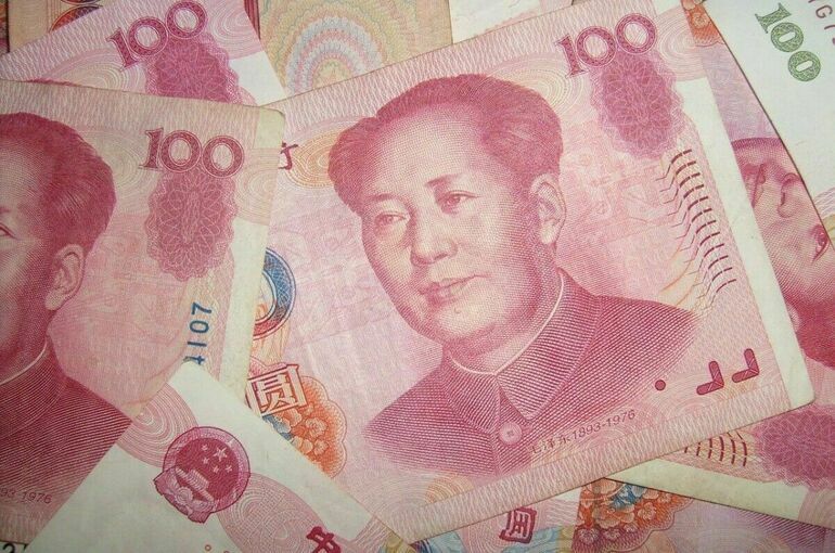Курс юаня упал до минимума к доллару с 2007 года