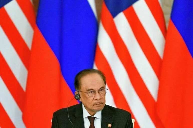 Премьер Малайзии пообещал передать слова Путина семьям жертв катастрофы MH17
