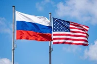 Ушаков: РФ и США обсуждали возобновление трехсторонних переговоров по Украине
