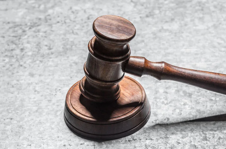 Суд заочно приговорил иноагента Дугарова* к 18 годам колонии